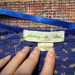 Purple colored 3/4 sleeve crochet style sweater from Urban Outfitters size S